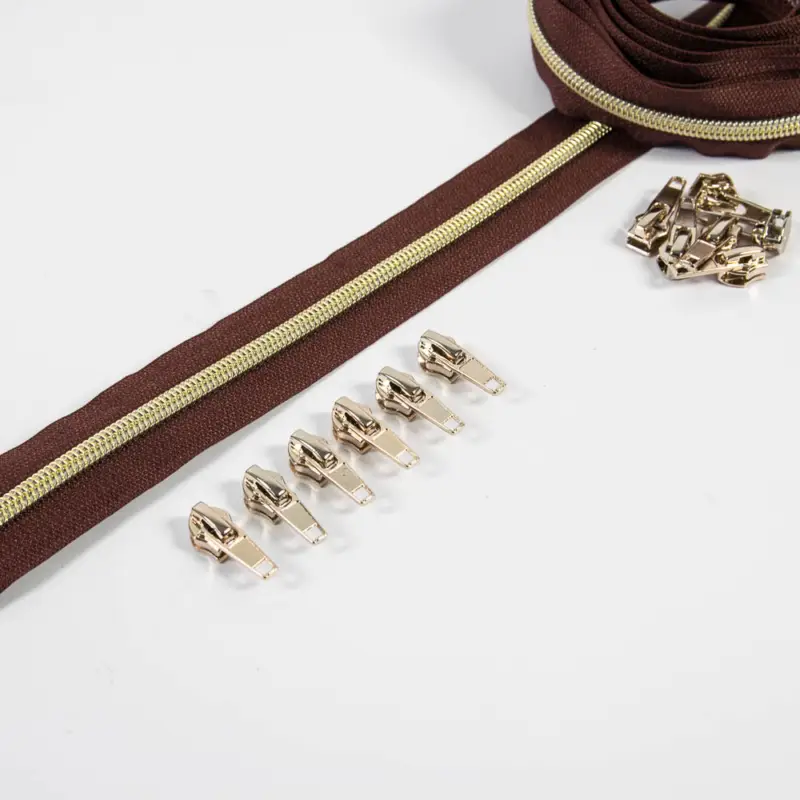 Neue Ware Reißverschluss 6,5 mm Raupe braun / gold - 3 Meter plus 12 Zipper