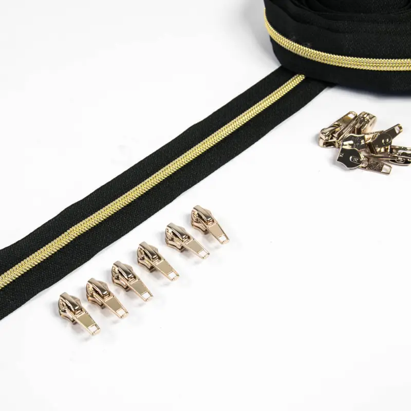 Reißverschluss 6,5 mm Raupe schwarz / gold - 3 Meter plus 12 Zipper Bestseller