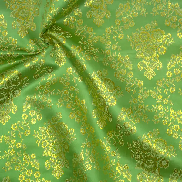 Aktuell Lurex Jacquard "Goldene Blumenranken" Farbe Grün